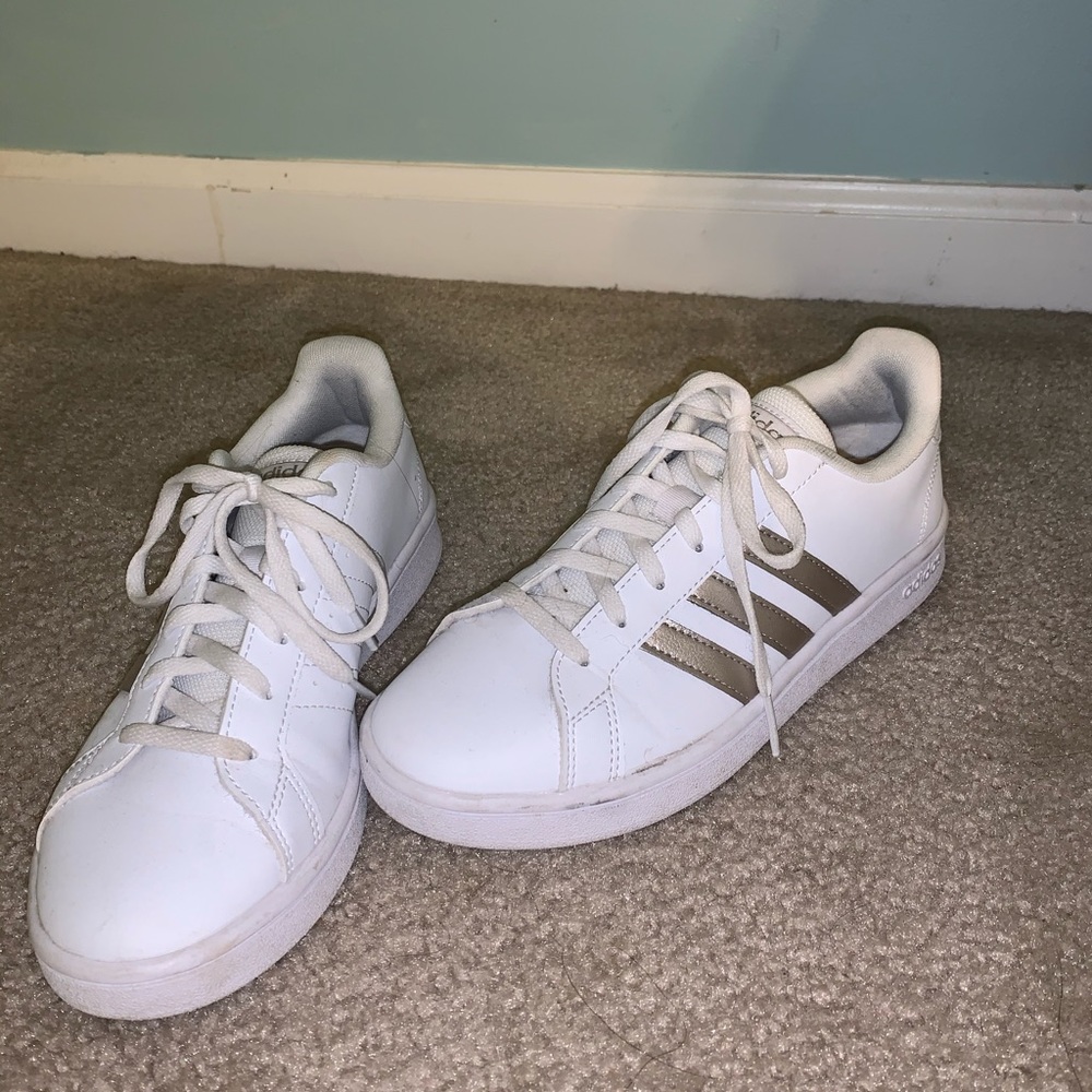 Adidas gold and white tennis shoes
